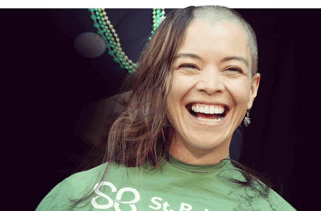 picture of a woman shaving her head