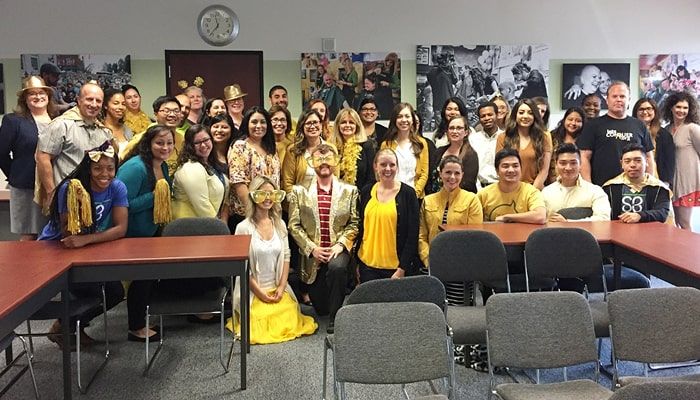 Large group of St Baldrick employees smiling for a group photo