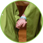 two shavees holding hands at heading shaving event