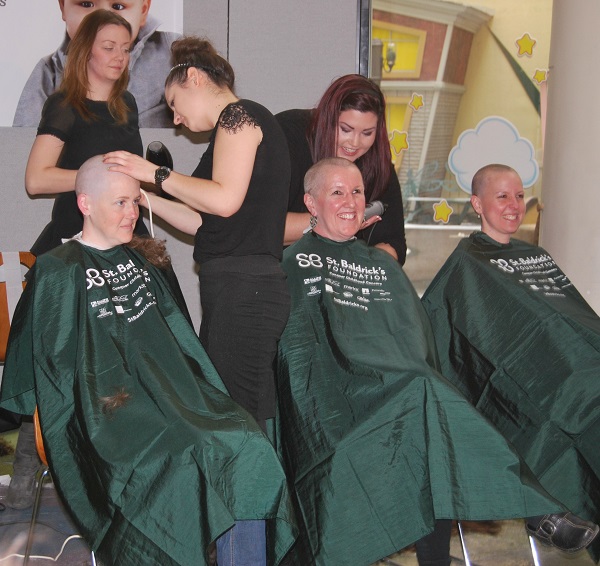 Pediatric oncology nurses go bald for kids cancer