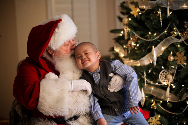 Ambassador Alan gets a kiss from Santa