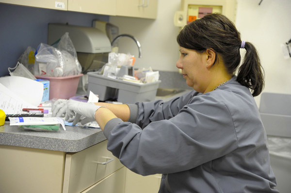 Kelly Clickner preparing pediatric cancer patient samples