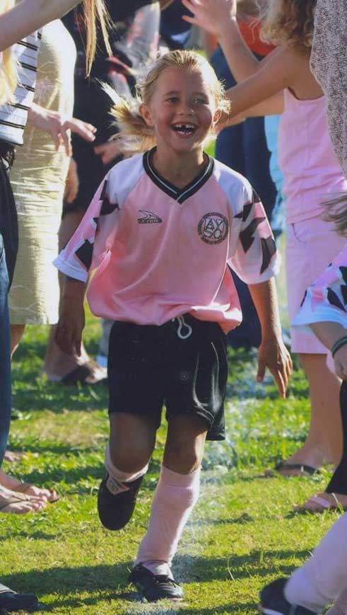 McKenna playing soccer