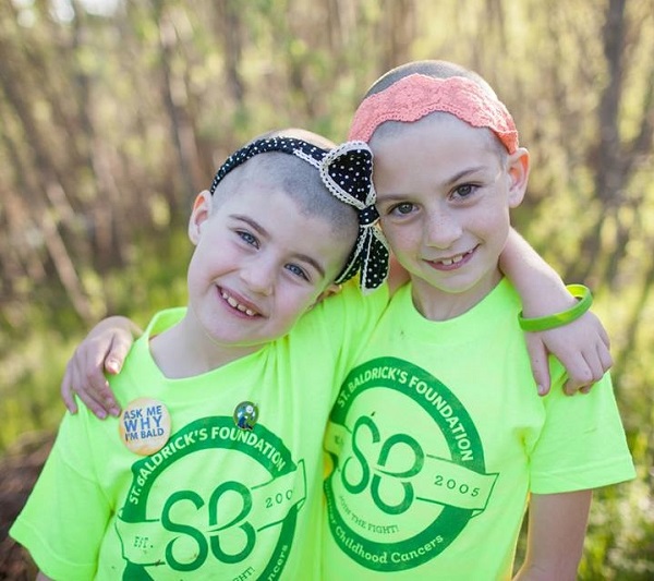 Kaela and Mara after shaving heads for cancer