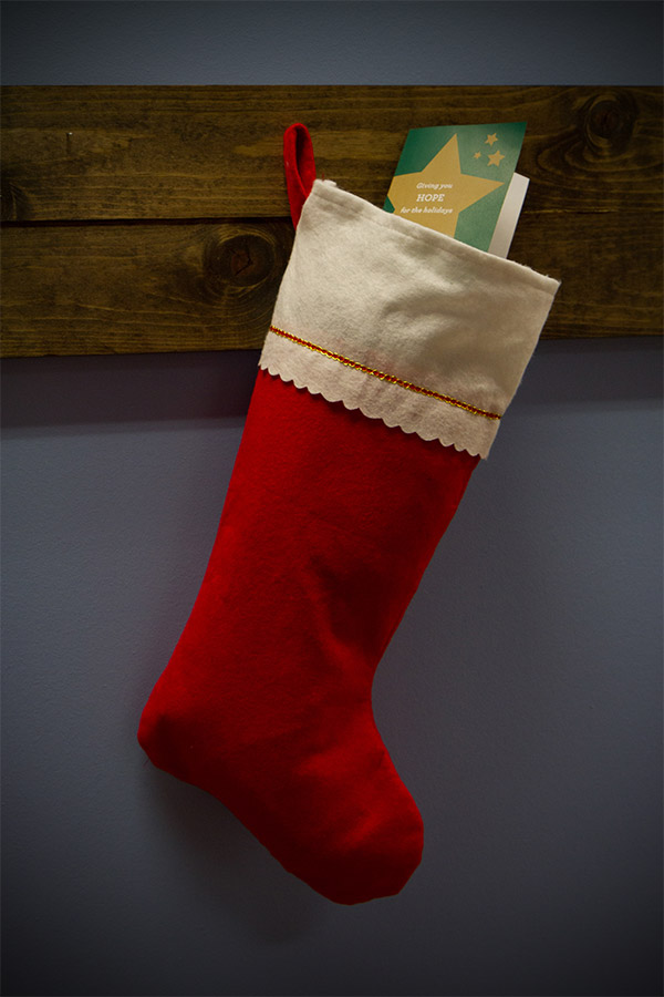 Christmas stocking with mini St. Baldrick's holiday card