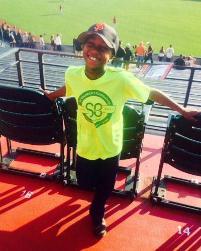 Harlem wears his St. Baldrick's t-shirt at a San Francisco Giants game