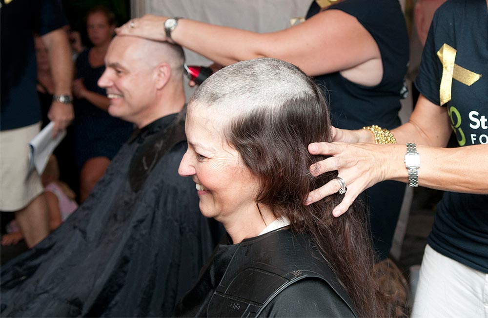 Gaylene and Nigel Meeson shaving heads for cancer