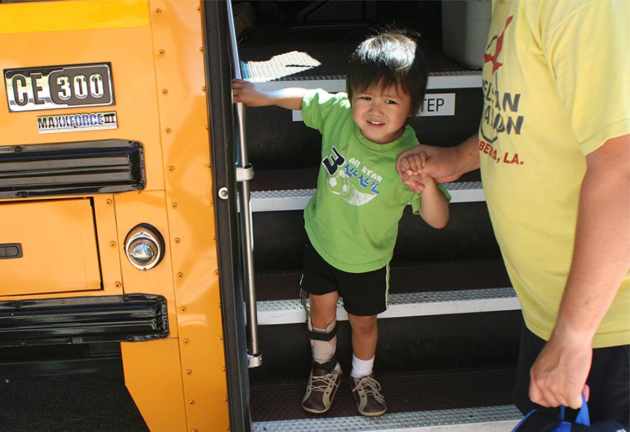 Alan getting off the school bus