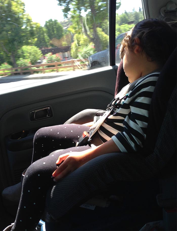Aubrey sleeping in the car