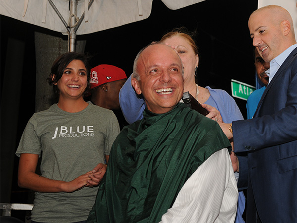 Congressman Ted Deutch laughs as he gets his head shaved at a St. Baldrick's event