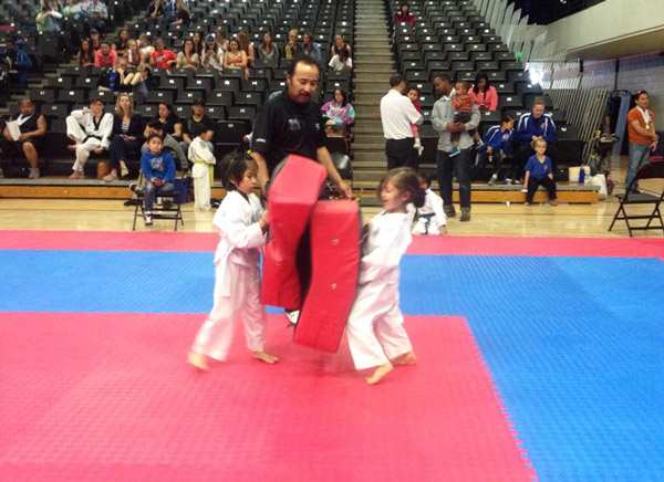 Daisy competing in a tae kwon do tournament