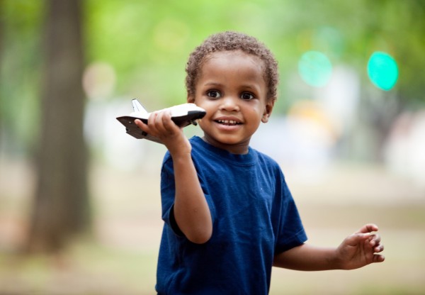 Four-year-old Khalid flies a toy space shuttle