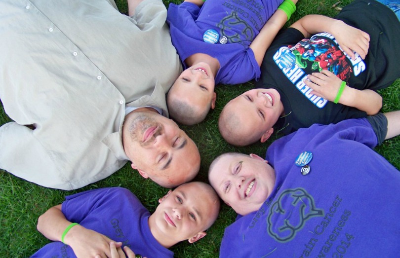 Jeremy relaxes with his family during a St. Baldrick's event