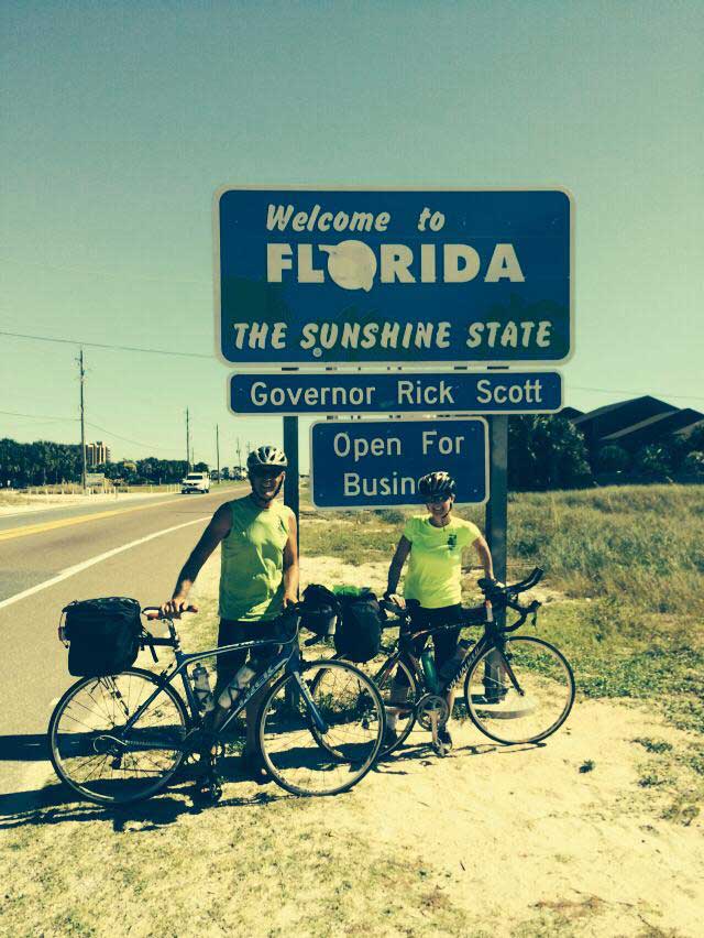 Kim and Jon in front of the Florida sign