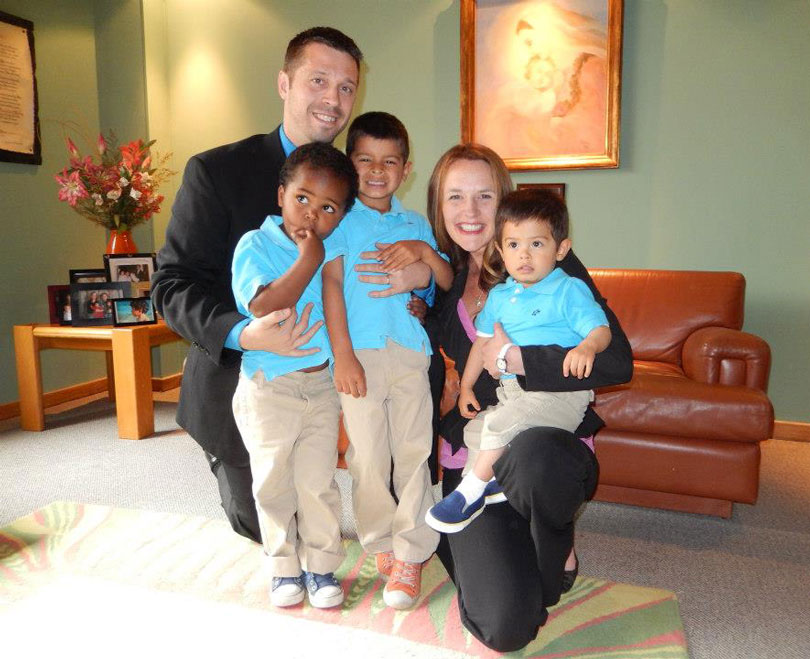 Ted and Erin Sibley with three of their four adopted children