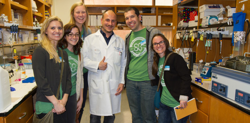 Dr. Fabbri poses with us in his lab
