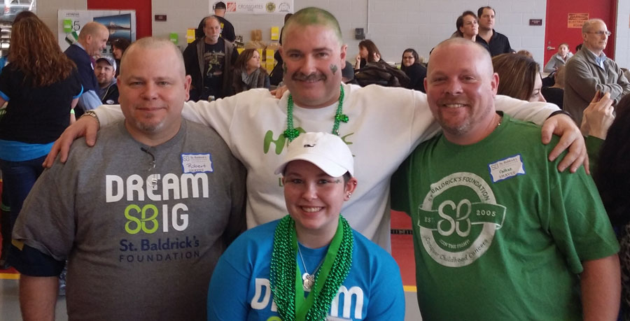 Nathan Pyne and the team Kendra's Cure after their shave this year.