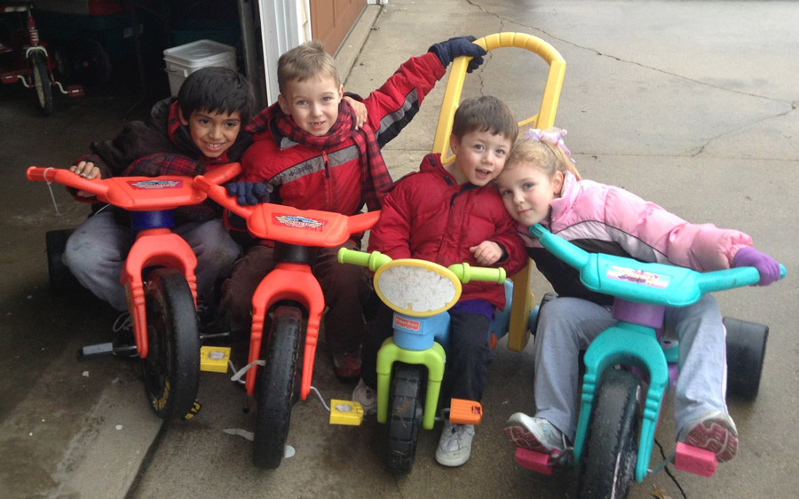 Joseph and his siblings riding bikes