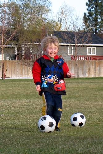 Sam plays soccer before he was diagnosed with cancer.