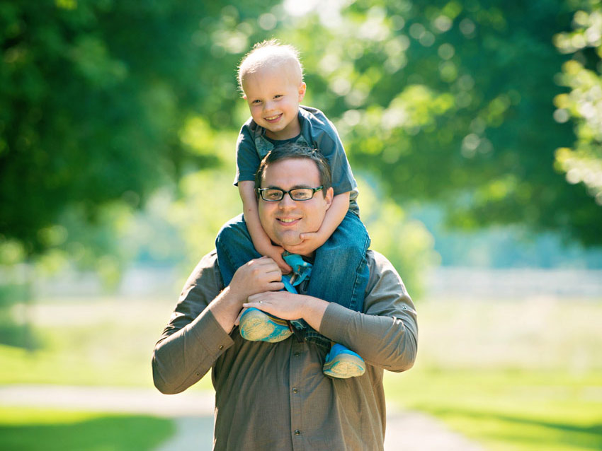 Chase sitting on his dad's shoulders