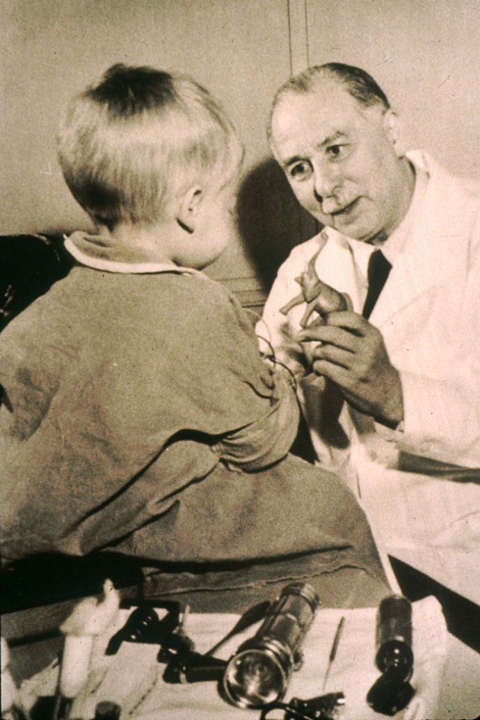 Dr. Sidney Farber meets with a patient