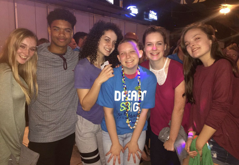 Cierra and her friends at the head-shaving event