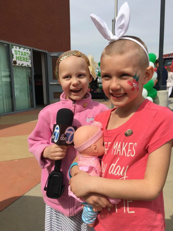 Lindsey and her best friend Hazel talk to a news reporter