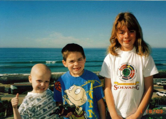 Young Nina poses with her younger brothers, William and Thomas