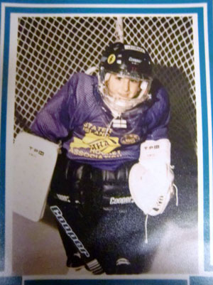 Johnny as a young kid in a hockey uniform