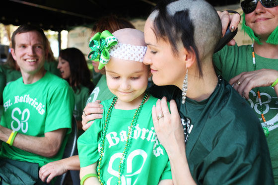 Mother with kid with childhood cancer at event