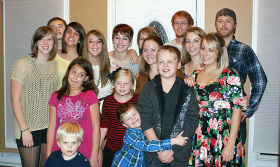 The cousin clan takes a group photo