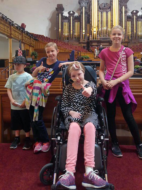 Avery and her siblings at a Mormon temple