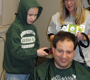 Teddy shaving Bill's head