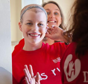 Sarah and her mom in red shirts