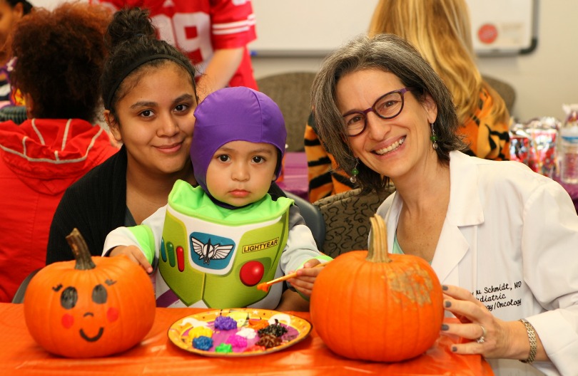 Dr. Mary Lou Schmidt with her patient, Isaac