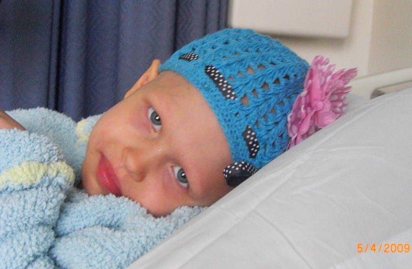 Sara smiling hospital bed