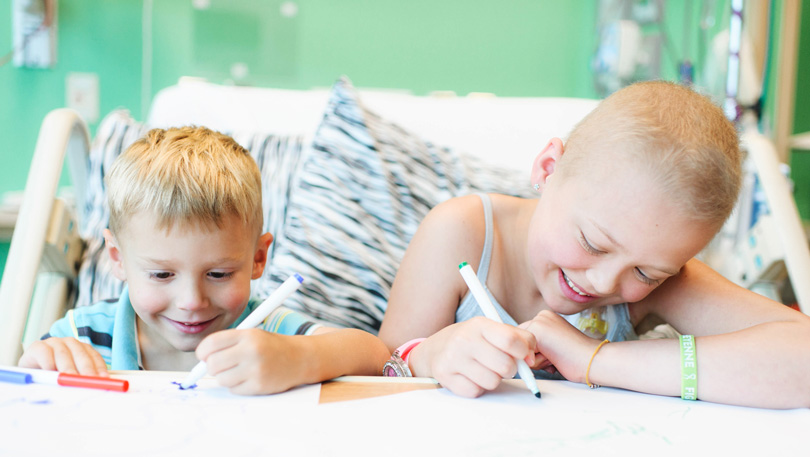 Cheyenne and Tristen coloring in the hospital