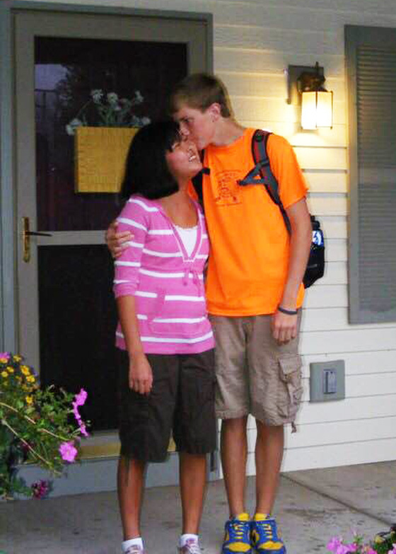 Hope with her brother on their porch