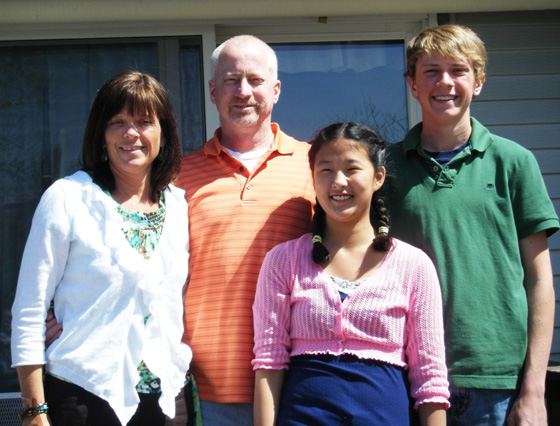 Hope with her mom and dad