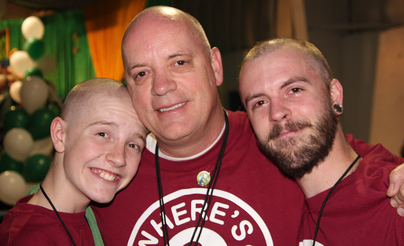 kyle and his sons at a head shaving event