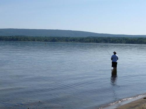 Zach fishes at a lake