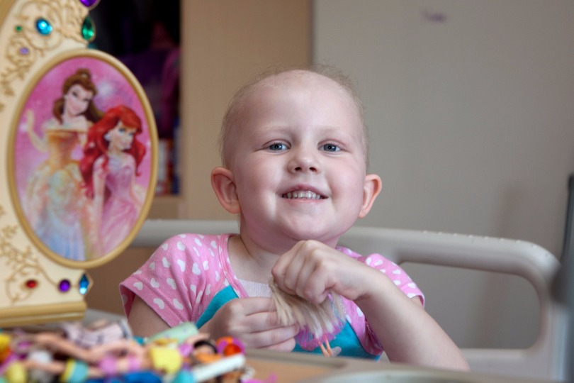 Honored Kid Grace in her hospital bed