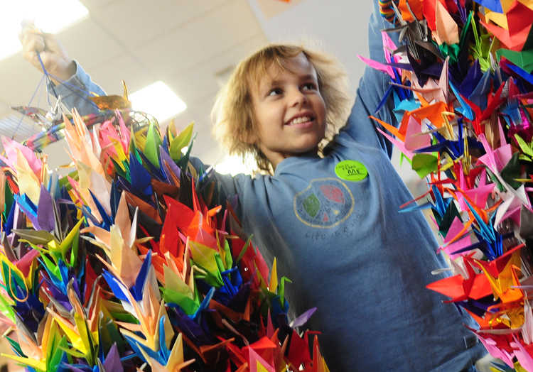 David with origami cranes