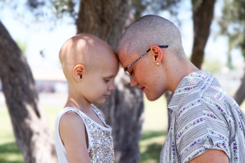 Hazel and her mom, Lauren, show off their bald heads