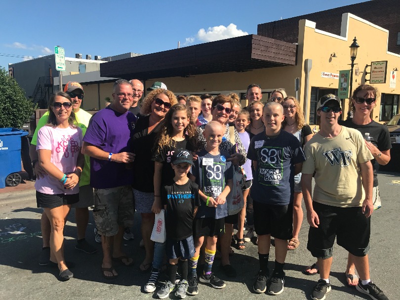 Mason's Slick Sluggers head-shaving team