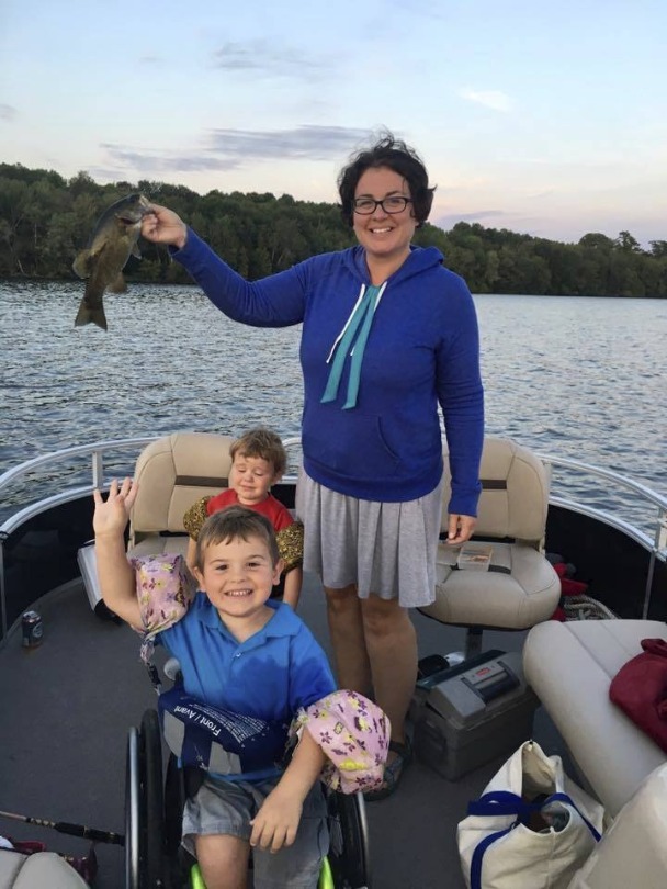 Kellan, his brother and his mom fish