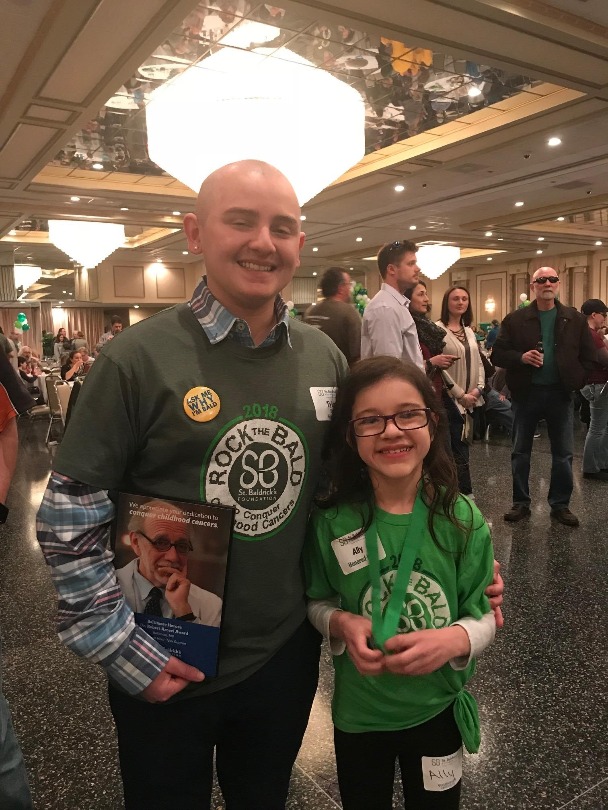 Tyler smiles with Honored Kid