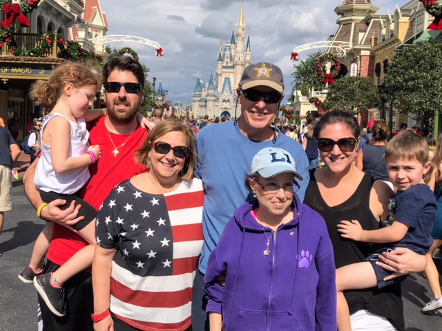 Melissa with her family at Disney