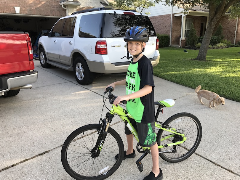 Honored Kid Sullivan rides his bike