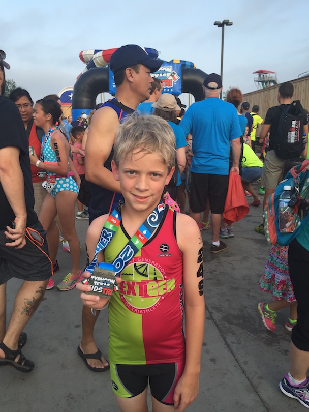 Honored Kid Sullivan finishes a triathlon before his diagnosis